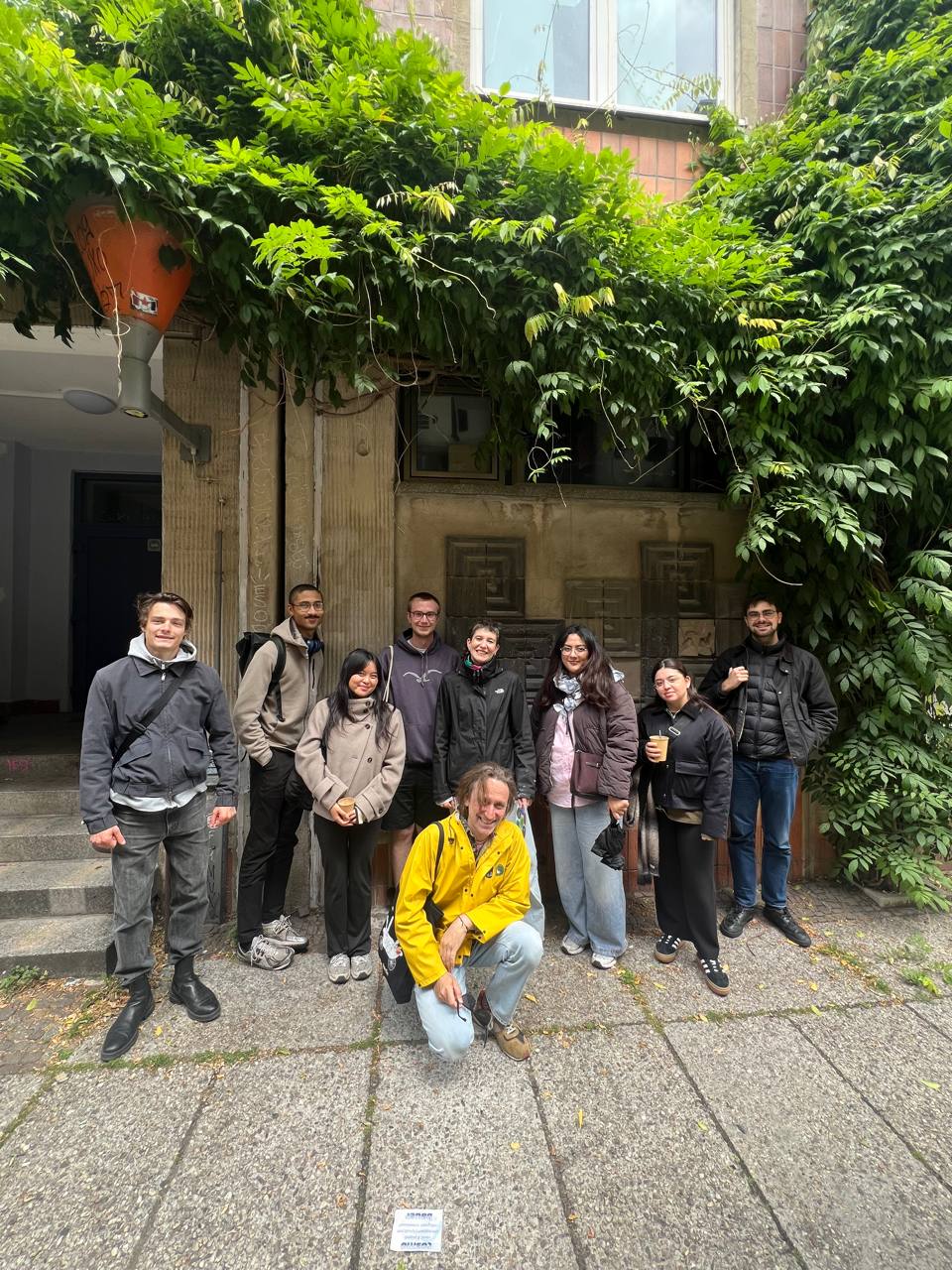 DDReams fieldwork team gathered in a housing estate courtyard